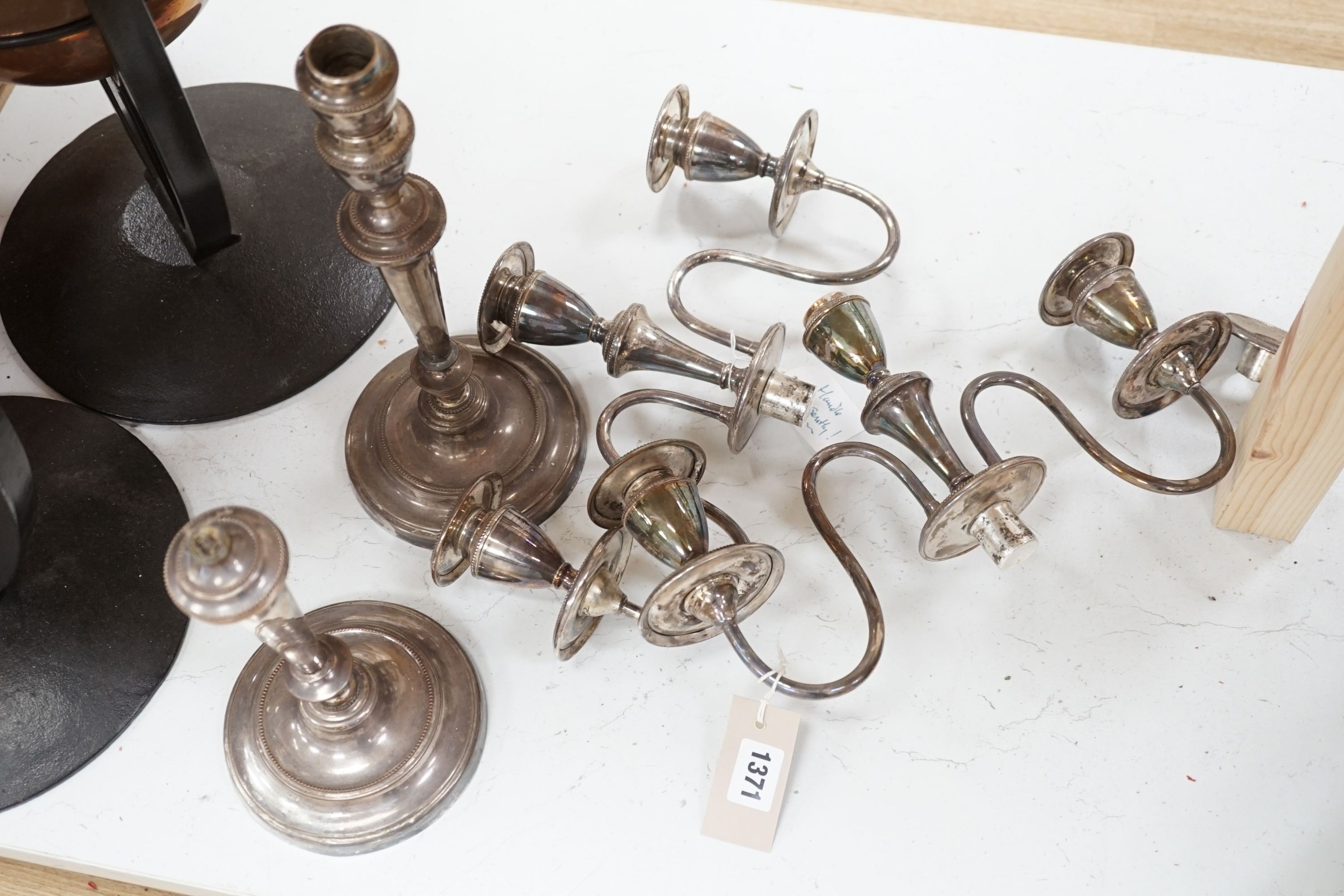 A pair of plated two branch, three light candelabra (1 a.f)